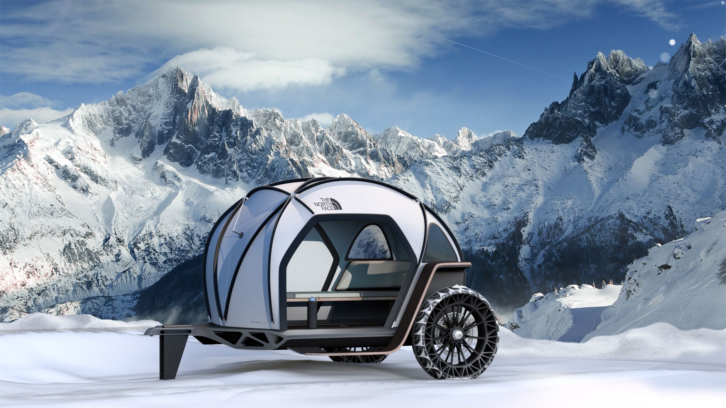 north face camper in snowy mountains