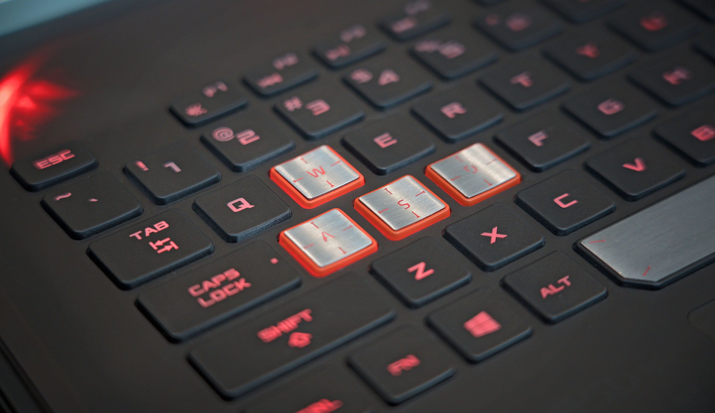 Detail view of custom WASD laptop keys.