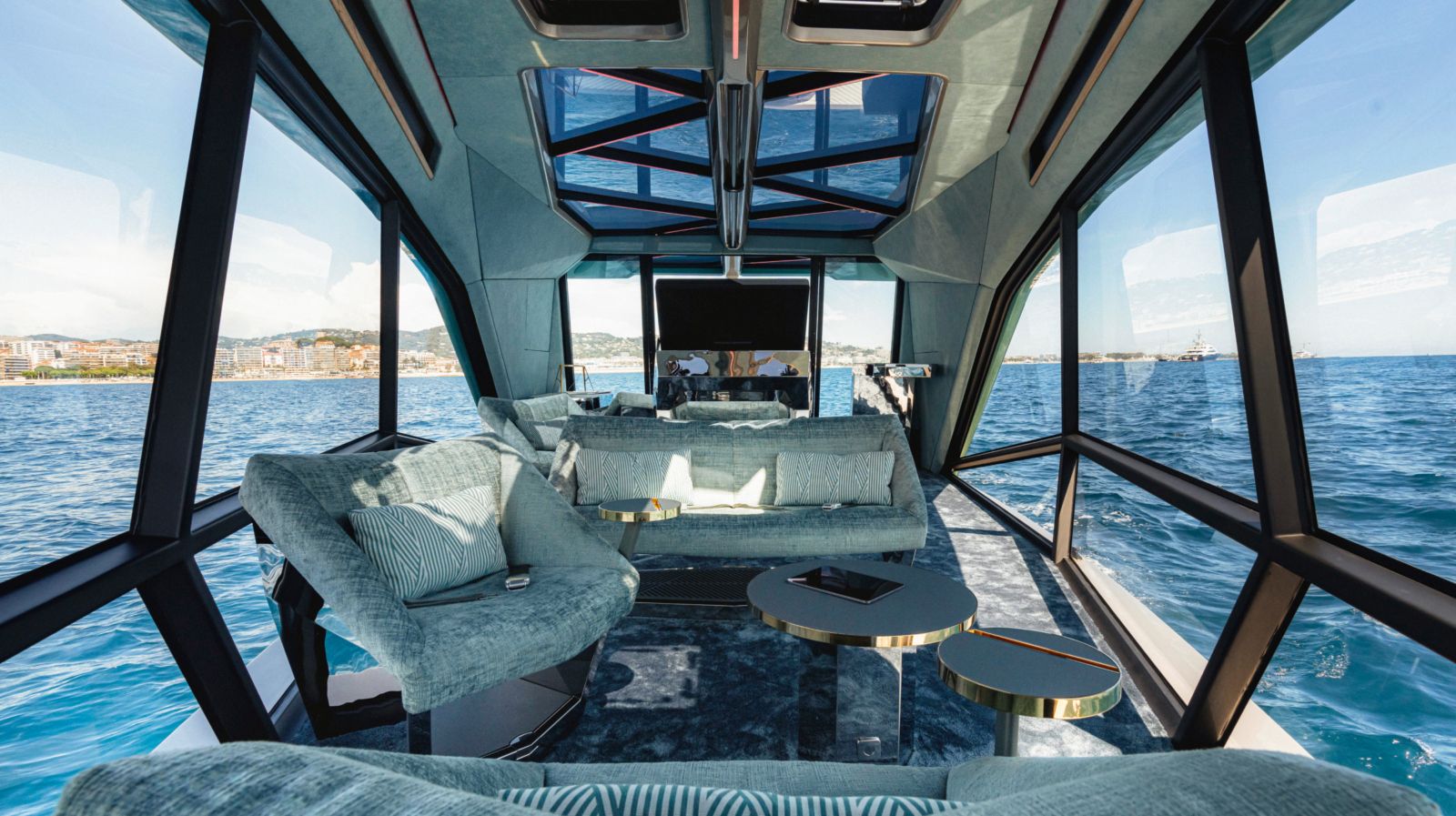 Interior of THE ICON showing ocean views and seating configuration.